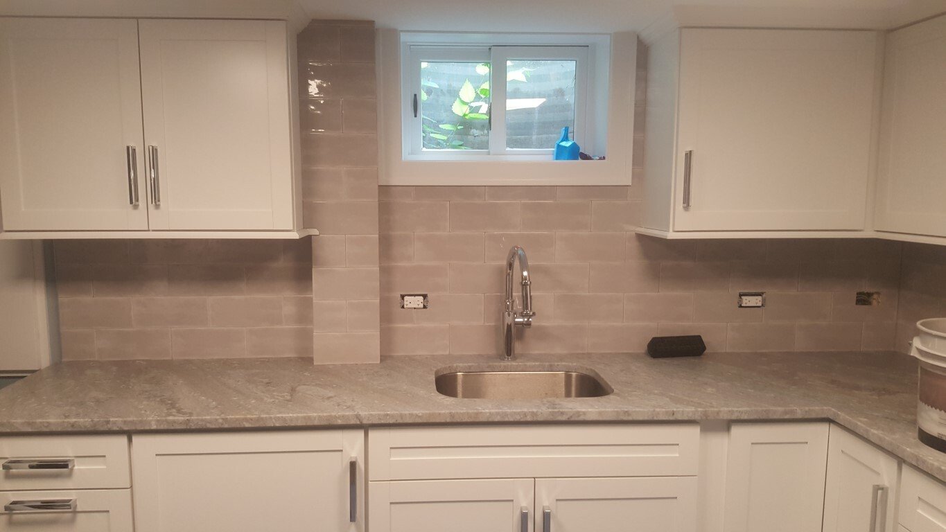 Ceramic Subway Tile Kitchen Backsplash Custom Cuts to Molding and Cabinets 