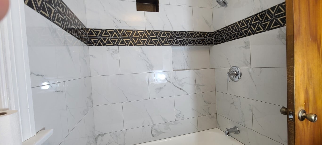 Porcelain Tub Surround with Marble and Metal Accent Band And Hidden Pocket 